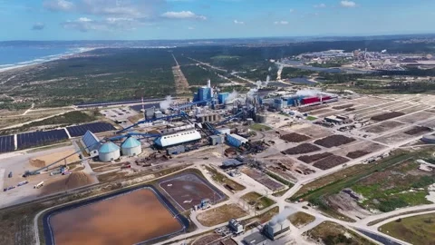 Aerial view of a large pulp mill processing biomass for cellulose production Stock Footage 340311538