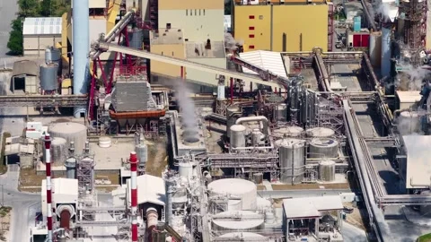 Aerial view of a large pulp mill producing cellulose Stock Footage 340311676