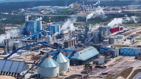 Aerial view of a large pulp mill processing biomass for cellulose production Stock Footage 340311995