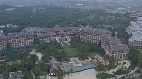 Aerial View of Large Resort Complex by Beach in Sanya Hainan China at Dusk Stock Footage 341710133