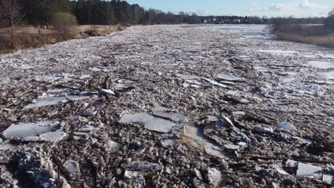 Aerial view of a large river of a huge blocks of pack ice going down to the sea Stock Footage 149819107