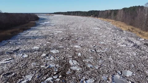 Aerial view of a large river of a huge blocks of pack ice going down to the sea Stock Footage 149819239