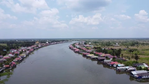 Aerial view of the large river in Margasari, South Kalimantan, housing on t.. Stock Footage 292507936