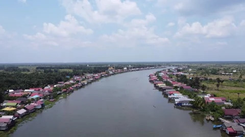 Aerial view of the large river in Margasari, South Kalimantan, housing on t.. Stock Footage 292508232