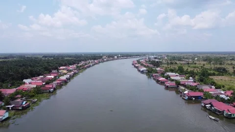 Aerial view of the large river in Margasari, South Kalimantan, housing on t.. Stock Footage 292508907