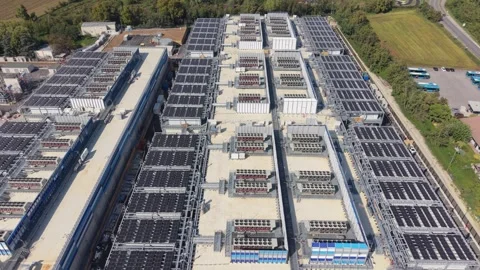 Aerial view of a large-scale data center facility within an industrial area Stock Footage 347843485