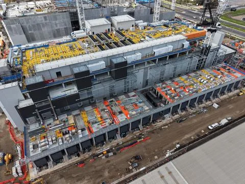 Aerial view large scale data centre industrial building construction site Stock Photos