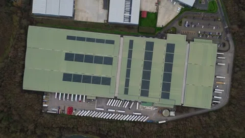 Aerial view of a large-scale distribution center and logistics hub with HGV Stock Footage 333307151
