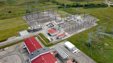 Aerial view of large scale electrical substation powering AI data center Stock Photos