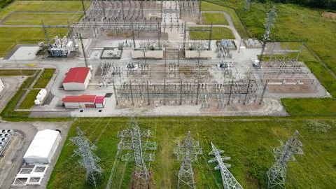 Aerial view large scale electrical substation powering AI data center Stock Photos