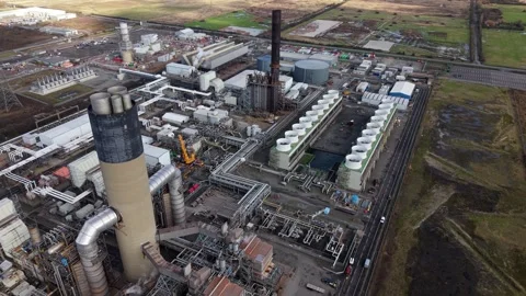 Aerial view of a large-scale gas-fired CCGT power station featuring a massive Stock Footage 340268481