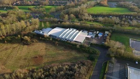 Aerial view of a large-scale quantum computing facility in the UK showcasing Stock Footage 333021459