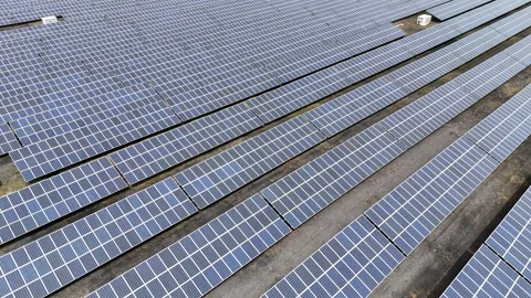 Aerial View of Large-Scale Solar Panel Farm Stock Footage 327983084
