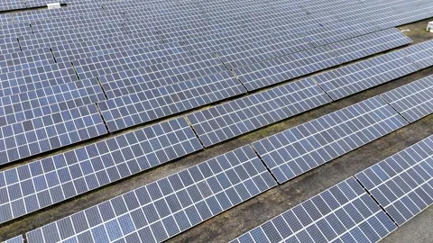 Aerial View of Large-Scale Solar Panel Farm Video stock 327983188