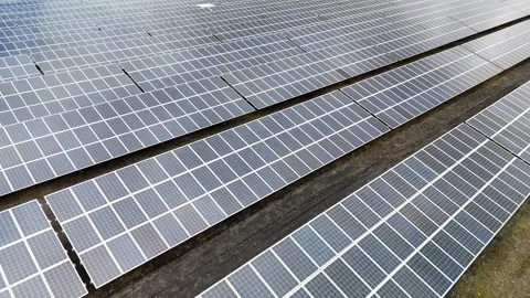 Aerial View of Large-Scale Solar Panel Farm Stock Footage 327983476