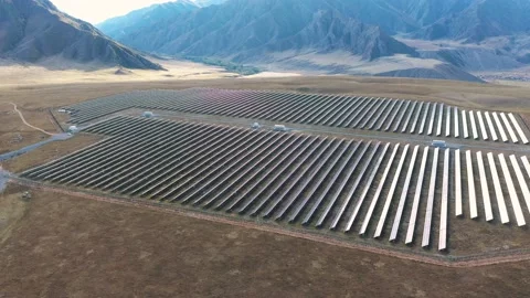 Aerial View Of Large Solar Panel Power Plant In Mountain Stock Footage 219815895