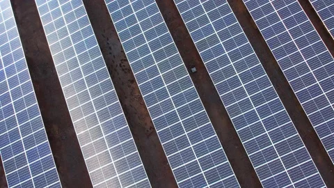 Aerial view of a large solar panel during sunrise Video stock 222542039