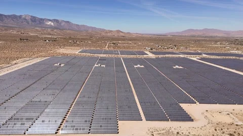 Aerial view of a large solar panel farm in the desert, United States. Stock Footage 334325685