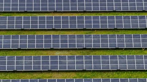 Aerial View of Large Solar Panel Farm in Green Countryside Germany Fotos Stock