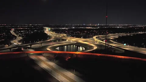 An aerial view of a large stack interchange on Florida's Turnpike on a clear Stock Footage 331968041