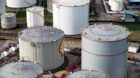 Aerial view of large storage tanks in an industrial facility Stock Footage 338994987