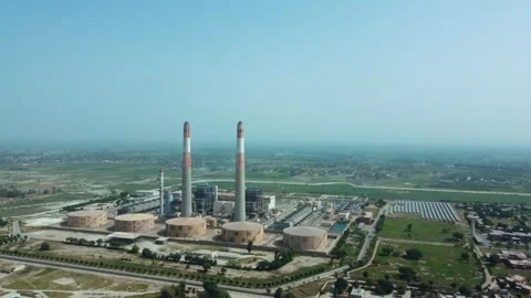 Aerial View of Large Thermal Power Plant in Arid Landscape Stock Footage 344404776