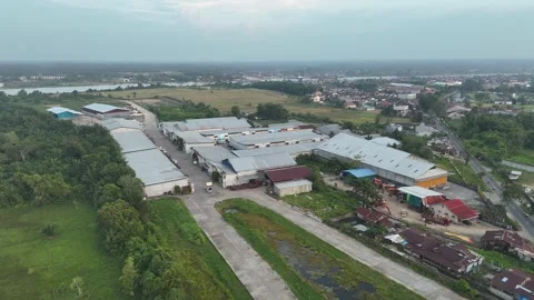 Aerial View of Large Warehouse Complex and Surrounding Rivers Video stock 347177907