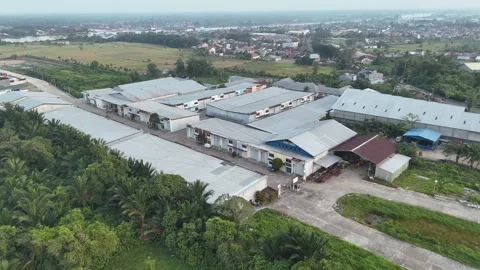 Aerial View of Large Warehouse Complex and Surrounding Rivers 스톡 동영상 347177910