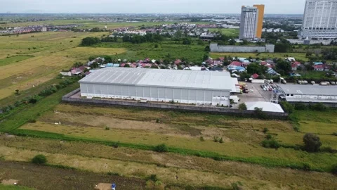 Aerial view of a large warehouse storing goods before distribution Stock Footage 315883602