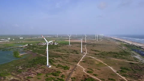 Aerial View of Large Wind Turbine Close Up with Rotating Blades Stock Footage 340553846