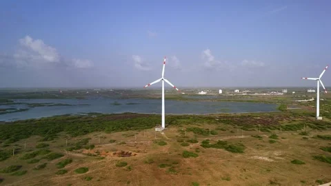 Aerial View of Large Wind Turbine Close Up with Rotating Blades Stock Footage 340553852