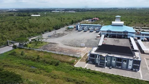 Aerial view of the largest bus station in Banjarmasin Stock Footage 327049954