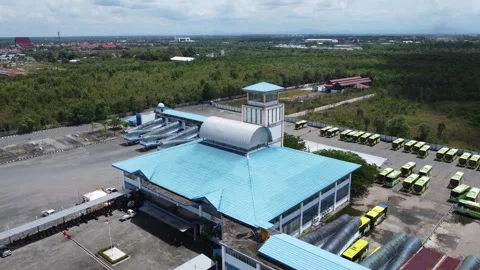 Aerial view of the largest bus station in Banjarmasin Stock Footage 327997536