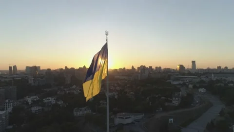 Aerial view. The largest state flag in Ukraine waving on the wind. Video stock 139300284