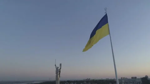 Aerial view. The largest state flag in Ukraine waving on the wind. Stock Footage 139300499
