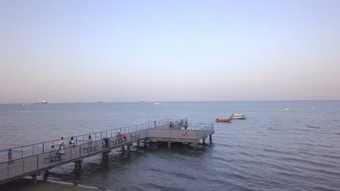 Aerial View of the Larnaca Beach Pier during Sunset Time, Cyprus Stock Footage 110802781