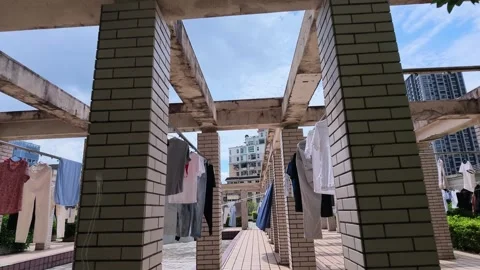 Aerial View Of Laundry Drying On Residential Rooftop With City Skyline Vídeos de archivo 343396861