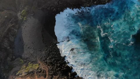 Aerial view of lava cliffs and ocean with waves. Lanzarote, Canary Islands. Stock Footage 130495334