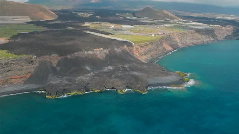 Aerial view of lava flows at seashore from last eruption in Cumbre Vieja Stock Footage 201051322