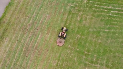 Aerial view of lawnmower work Stock Footage 104765210