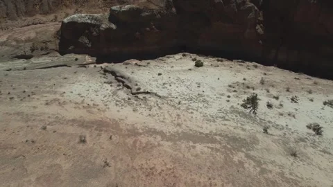 Aerial view of layered sandstone with striped erosion in Altyn Emel Stock Footage 345410105