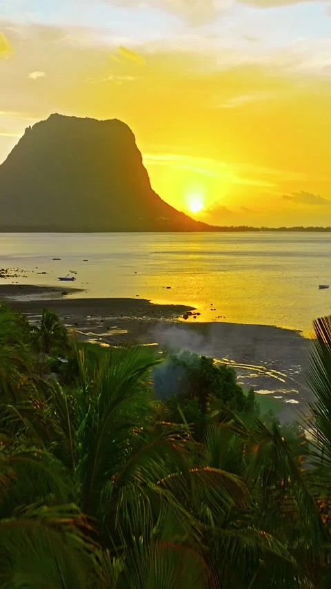 Aerial view of Le Morne Peninsula, Le Morne Brabant Mountain. Sea lagoon formed Stock Footage 343325533
