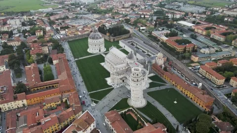 Aerial view of leaning Tower and Pisa Baptistery, Italy. Stock Footage 322123730