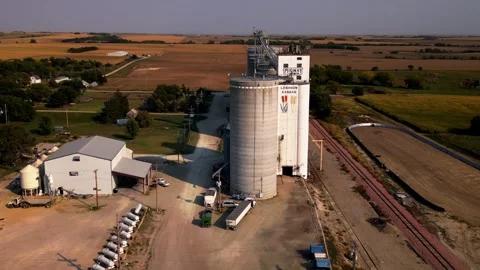 Aerial view of the Lebanon grain elevator and silos beside the railroad Stock Footage 345532651