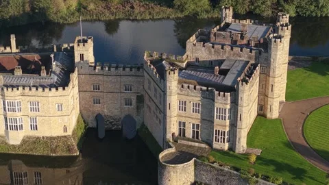 Aerial View Of Leeds Castle Surrounded By Moat During Daytime In Kent, England Stock Footage 296170667