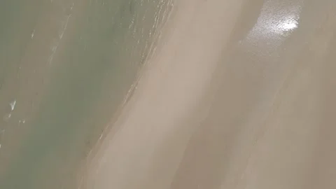 Aerial view of Les Braves memorial sculpture on Omaha Beach, Normandy, France 스톡 동영상 337874788