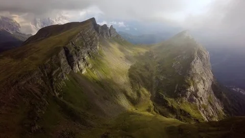 Aerial view of light over panorama in Dolomites Stock Footage 80146968