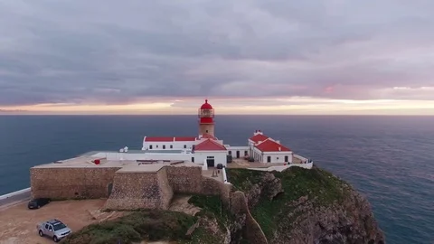 Aerial View lighthouse and cliffs at Cape St. Vincent at sunset. Europe's most Stock Footage 75299584