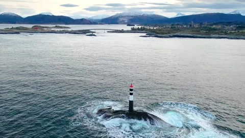 Aerial View of Lighthouse and Crashing Waves Near Atlantic Ocean Road, Norway Stock Footage 315501688