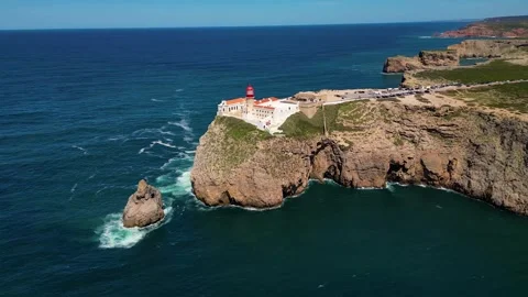 Aerial View on Lighthouse of Cape St. Vincent Algarve Portugal Stock Footage 332720245